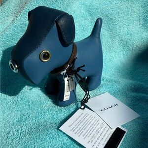 Authentic limited edition COACH collectible dog paperweight.